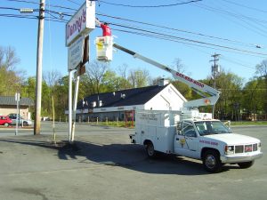 Sign being serviced by Wurtsboro Electric